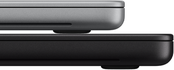 MacBook Pro de 14 pulgadas con pantalla PROLED XDR, color plata, encima de un modelo de 16 pulgadas, color negro espacial, se muestra la diferencia de tamaño