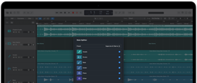 MacBook Pro, Logic Pro, pistas de ondas, panel Divisor de Stems, categorías: voces, batería, bajo, otros, cada una con una onda de audio independiente