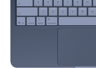 Imagen desde arriba de un MacBook Neo en índigo que muestra las teclas a juego y el trackpad Multi‑Touch